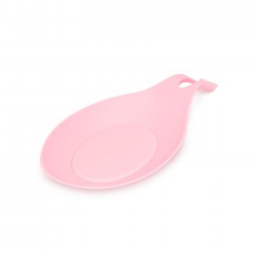 Suport roz siliconic pentru lingura de gatit