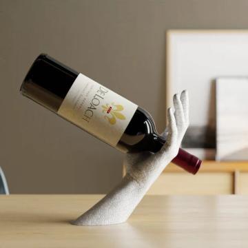 Suport Hand Gravity pentru sticla de vin de la Speedbox SRL